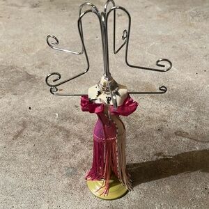 This is a vintage jewelry stand, Room, pink and beige with beating